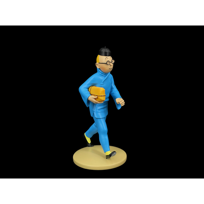 Tim-und-Struppi-Figur - Tim mit einem Paket - Der Blaue Lotus 12 cm 42251