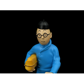 Tim-und-Struppi-Figur - Tim mit einem Paket - Der Blaue Lotus 12 cm 42251